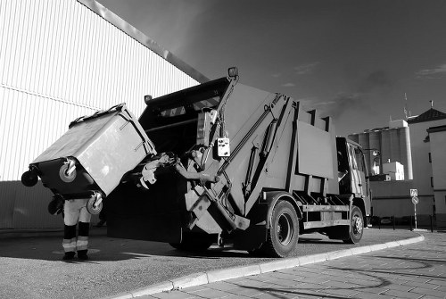 Professional team clearing out a cluttered garage